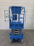 Genie GS-1930 scissor lift, stowed, rear view of guardrails, scissor arms and wheels