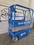 Blue Genie GS-1930 electric scissor lift, stowed, rear three-quarter view with platform and wheels