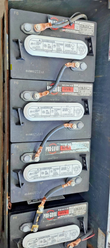 Skyjack S3219 battery bank: Pro-Guide 6-volt batteries wired in series with copper cable connectors