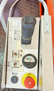 Skyjack S3219 platform control box: joystick, function toggle switches, battery charge gauge and e-stop