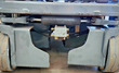 Skyjack S3219 undercarriage: steer cylinder and tie rod, brass hydraulic block, pothole guards, solid tires