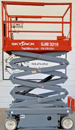 Skyjack SJIII 3219 electric scissor lift partially raised on extended scissor arms, red platform, gray chassis