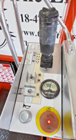 Skyjack platform control box: joystick, function toggle switches, battery charge gauge, horn and red emergency stop