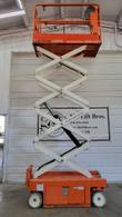 Snorkel S3219E electric scissor lift fully raised, side view