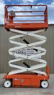 Snorkel S3226E scissor lift with platform partly raised, side view showing the white scissor stack