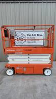 Snorkel S3226E scissor lift, stowed, close side view with Snorkel S3226E decal