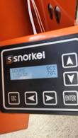 Snorkel control display reading 128 hours on the hour meter and 70 percent battery charge