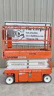 2020 Snorkel S3219E electric scissor lift, stowed, side view in front of the Lift Bros sign