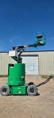 JLG E300AJP boom lift, mast raised and extended, side view