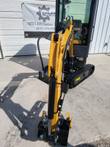 AGT H13R yellow boom and stick head-on, hydraulic cylinders and hoses running down to the bucket