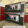 Two stacked Covermore 21x40x6.5 shelter kit crates with printed spec and dimension labels