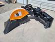 Wolverine stump grinder top view, orange housing and grinding mechanism