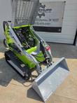ATS T460 mini skid steer with engine cover fully raised, exposing the engine bay and hydraulic lines