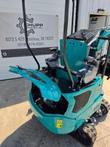 CFG KV16R mini excavator, engine hood open above joystick controls and operator seat