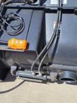 JCT mixer control box with yellow push-button and hydraulic hose routing visible