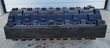 Padfoot vibratory roller drum from above, rows of raised square compaction pads across the full width
