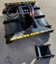 Brush cutter deck at an angle, yellow DANGER and BRUSH CUTTER lettering, twin-pin mounting bracket alongside