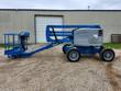Genie Z-45/25 articulating boom lift, boom stowed, side view