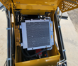 AGT MX-CRT23 hydraulic oil cooler under the raised engine hood with steel hydraulic lines