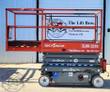 Red Skyjack SJIII 3219 scissor lift lowered, slide-out extension deck pushed out and the guardrails up