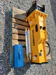 SDCH680 hydraulic hammer on a pallet with two spare chisels and a blue tool box