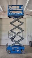 Genie GS-1930 scissor lift raised, scissor stack extended, front view