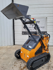 Landhero LDH-T460 with loader arms raised and the gray bucket lifted overhead, rubber tracks and side marker lights