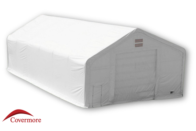 White 30x60x22 dual-truss PVC fabric building, front winch door, man door and two peak vents