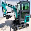 Teal MH13RX mini excavator with enclosed cab, toothed bucket and thumb, dozer blade and rubber tracks