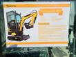 FF13 spec placard: 1,896 lb, 13.5 hp at 3,600 rpm, 0.03 cu yd bucket, 0-3 km/h travel, 6.6 L fuel, 15 L hydraulic