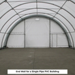 End wall inside a single pipe PVC fabric building, center door panel and truss bracing