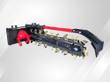 Raytree RMT48 skid steer trencher, red boom and quick-attach plate, digging chain with carbide teeth