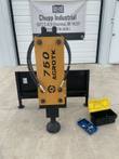 AGROTK 750 hydraulic post driver mounted on skid steer quick-attach frame