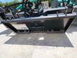 Back of the soil conditioner: welded quick-attach mounting plate carrying the spec label