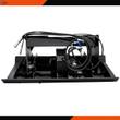 JCT vibratory compactor frame from above: black eccentric weight discs, blue hydraulic motor and coiled hoses