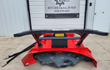 Raytree RMDM70 disc mulcher, front view with cutting disc, quick-attach arms, and flow-rate sticker