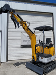 SDLE20 mini excavator with the boom raised to full height, bucket curled and hydraulic thumb open, canopy and seat