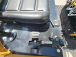 AGT H12R mini excavator controls beside the seat: hour meter, keyed ignition, throttle knob and work-light switch