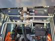 AGT YSRT14 hydraulic valve block and steel lines routed above the gasoline engine