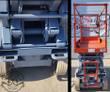 SkyJack scissor lift details: gray scissor stack and hydraulic hoses, and the orange platform with guardrails from the rear