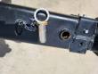 Ring-handle stop pin and lanyard clip set in the jib boom's telescoping adjustment hole