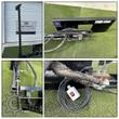 Wolverine sickle bar mower: serrated cutter bar raised upright, quick-attach mount plate, valve block and switch box