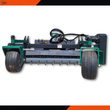 78-inch soil conditioner on a white background: toothed drum, green gauge wheels and hydraulic drive motor