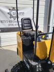 AGT H12R mini excavator operator station: black vinyl seat, joysticks, canopy posts and padded footwell