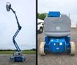 Blue Genie articulating boom lift raised to full height, with a rear view of the Genie turret cover and treaded tires