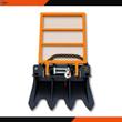 Arteer skid steer logging winch: cable drum and hook, orange mesh guard, and the toothed ground anchor blade below