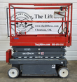 Skyjack SJIII 3219 scissor lift, platform lowered, front view, unit 61265