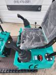 AGT MH12RX operator seat in factory wrap, joystick control and ignition key switch