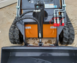 Landhero LDH-T460 loader arm hydraulics: tilt cylinder, three quick-couplers with red caps, rubber tracks and bucket