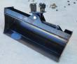 32-inch tilt bucket, smooth open interior and cutting edge, hydraulic tilt cylinder and twin-pin bracket on top